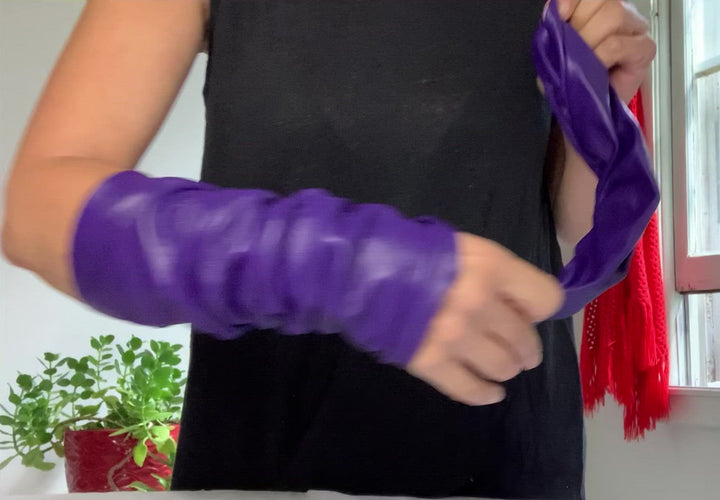 Product video: Lamia showing how to wear purple leather fashion arm sleeves