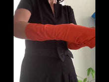 Load and play video in Gallery viewer, Close up youtube Product video. lamia showing fashion arm sleeves in orange 
